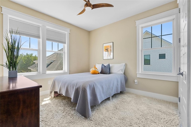 1224 Union Club Dr, Winter Garden, FL 34787 - bedroom with carpet flooring, baseboards, and ceiling fan