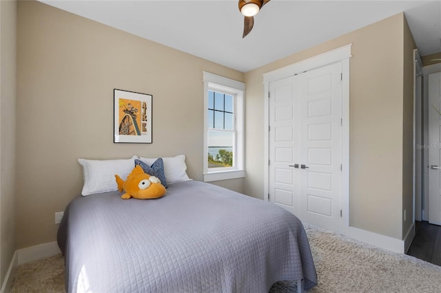 1224 Union Club Dr, Winter Garden, FL 34787 - carpeted bedroom with baseboards, a closet, and ceiling fan