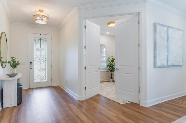 11826 Fiore Dr, Orlando, FL 32827 - entrance foyer with baseboards, crown molding, and light wood-style flooring