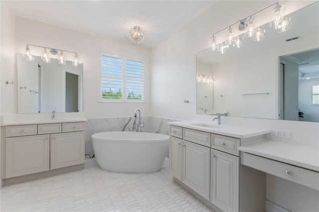 11826 Fiore Dr, Orlando, FL 32827 - bathroom featuring a soaking tub, a wealth of natural light, and a sink