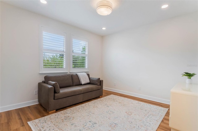 11826 Fiore Dr, Orlando, FL 32827 - sitting room with light wood finished floors, baseboards, and recessed lighting