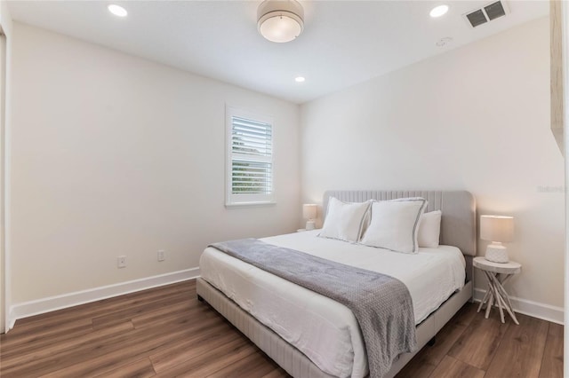 11826 Fiore Dr, Orlando, FL 32827 - bedroom featuring baseboards, visible vents, wood finished floors, and recessed lighting
