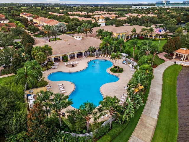 11826 Fiore Dr, Orlando, FL 32827 - community pool with fence, a gazebo, and a patio area