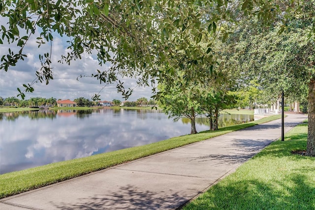 11826 Fiore Dr, Orlando, FL 32827 - view of home's community with driveway and a water view