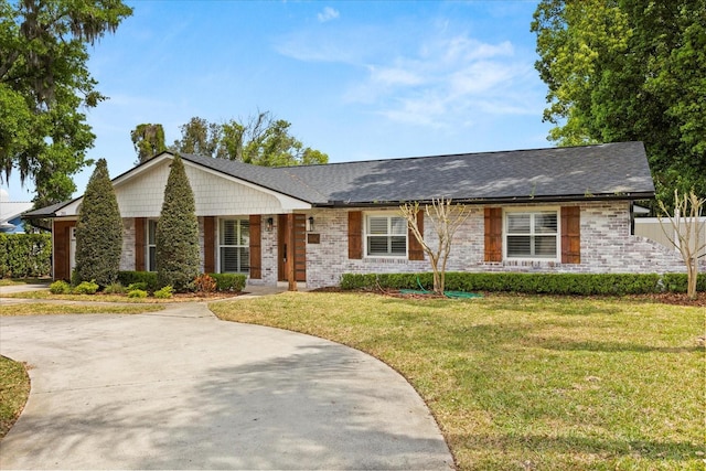 201 Cedarwood Dr, Maitland, FL 32751 - ranch-style house featuring brick siding and a front yard