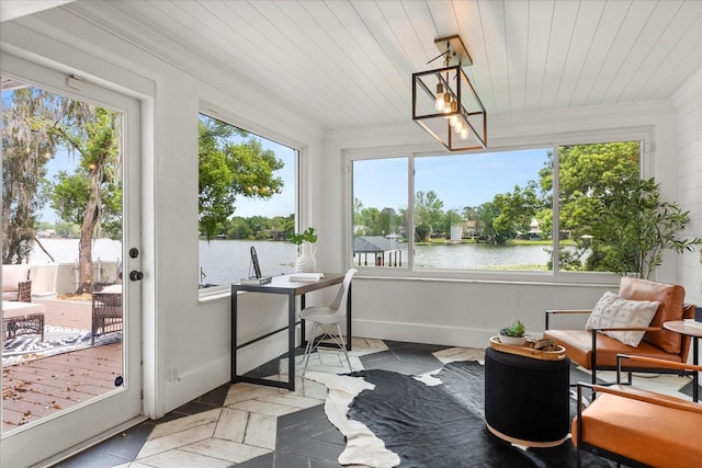 201 Cedarwood Dr, Maitland, FL 32751 - sunroom / solarium with a water view, baseboards, ornamental molding, an inviting chandelier, and wood ceiling