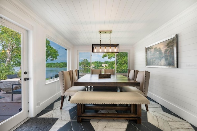 201 Cedarwood Dr, Maitland, FL 32751 - dining space with baseboards and wooden ceiling