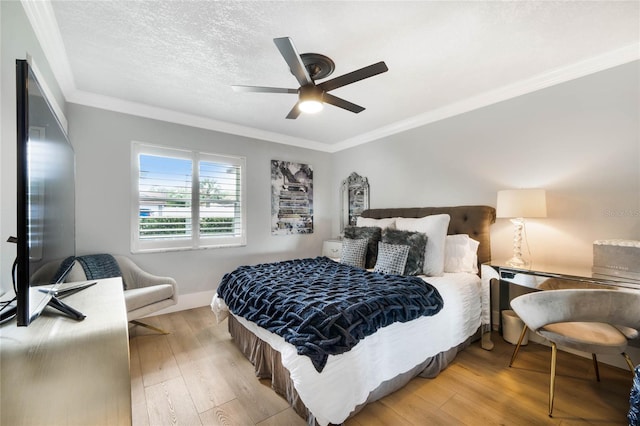 201 Cedarwood Dr, Maitland, FL 32751 - bedroom with a textured ceiling, light wood-style flooring, ceiling fan, and crown molding