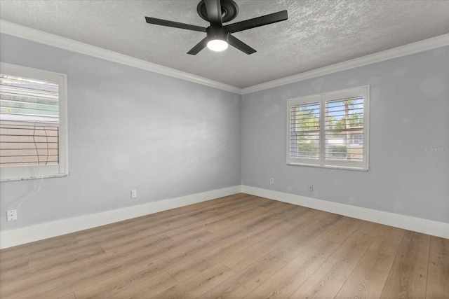 201 Cedarwood Dr, Maitland, FL 32751 - unfurnished room with a ceiling fan, ornamental molding, a textured ceiling, and wood finished floors