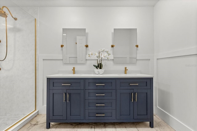201 Cedarwood Dr, Maitland, FL 32751 - bathroom with a shower stall, double vanity, and a sink