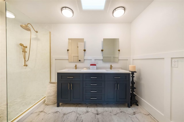 201 Cedarwood Dr, Maitland, FL 32751 - full bathroom featuring marble finish floor, double vanity, tiled shower, and a sink