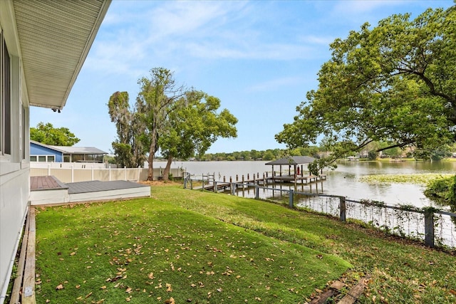 201 Cedarwood Dr, Maitland, FL 32751 - exterior space featuring boat lift, a water view, fence, and a lawn