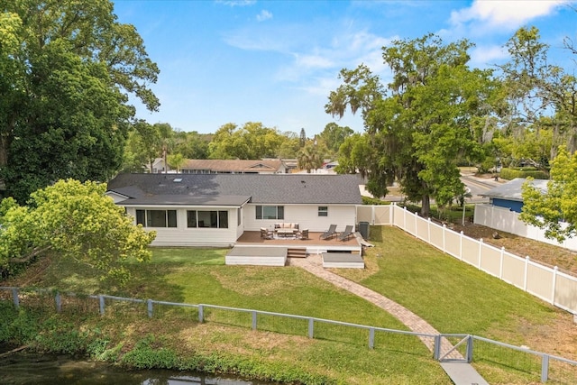 201 Cedarwood Dr, Maitland, FL 32751 - rear view of property featuring a lawn, a gate, a fenced backyard, and a wooden deck