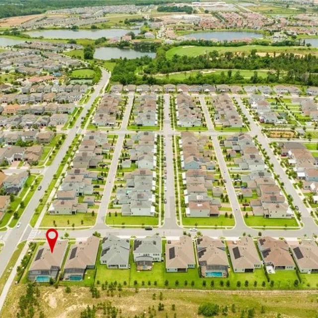 14711 Winter Stay Dr, Winter Garden, FL 34787 - aerial view of property and surrounding area featuring a large body of water and nearby suburban area