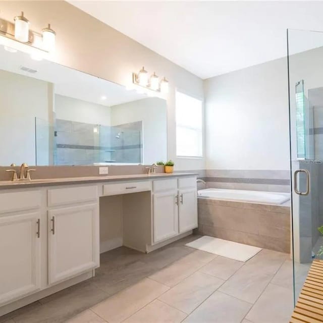 14711 Winter Stay Dr, Winter Garden, FL 34787 - full bath featuring a shower stall, a bath, vanity, and tile patterned flooring