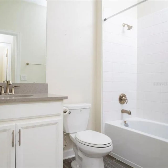 14711 Winter Stay Dr, Winter Garden, FL 34787 - full bathroom with toilet, tub / shower combination, and vanity