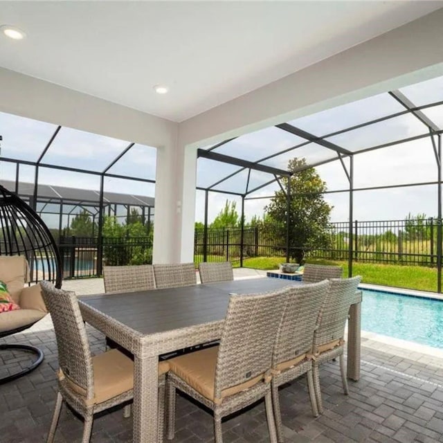 14711 Winter Stay Dr, Winter Garden, FL 34787 - view of patio featuring an outdoor pool and glass enclosure