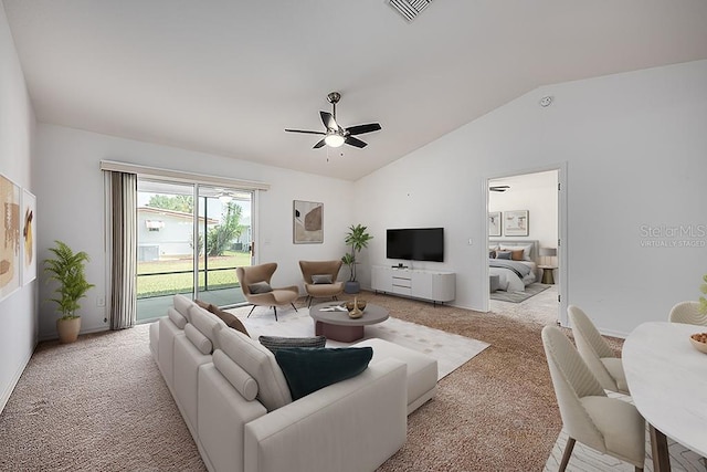 living room with light carpet, lofted ceiling, visible vents, and ceiling fan