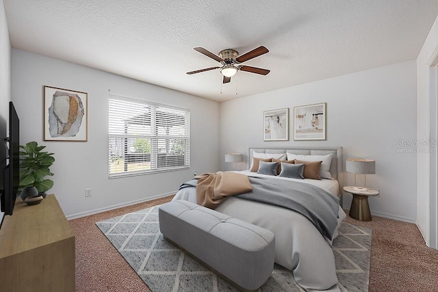 bedroom with baseboards, carpet floors, a textured ceiling, and a ceiling fan