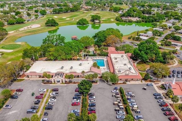 aerial view featuring view of golf course and a water view