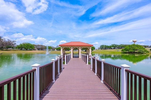 dock area featuring a gazebo and a water view