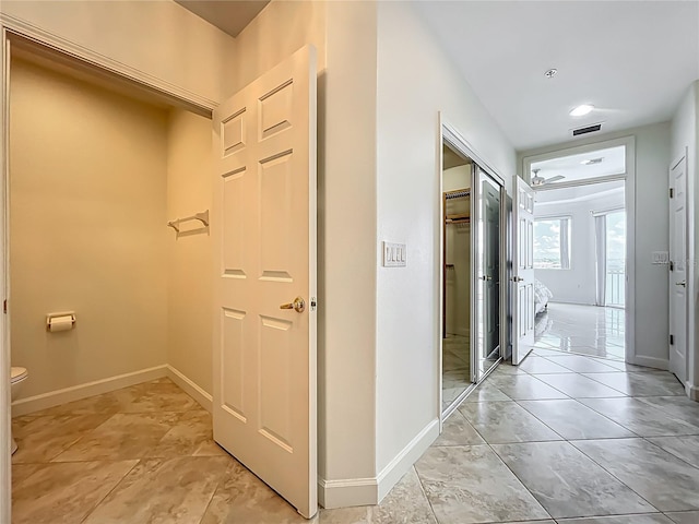 8743 S The Esplanade Unit 18, Orlando, FL 32836 - corridor with baseboards