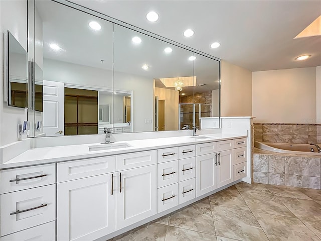 8743 S The Esplanade Unit 18, Orlando, FL 32836 - bathroom with double vanity, a bath, recessed lighting, and a shower with door