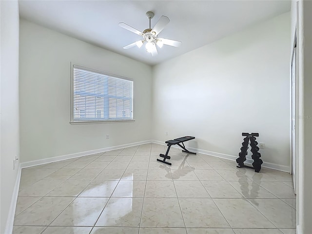 8743 S The Esplanade Unit 18, Orlando, FL 32836 - workout room with a ceiling fan and light tile patterned flooring