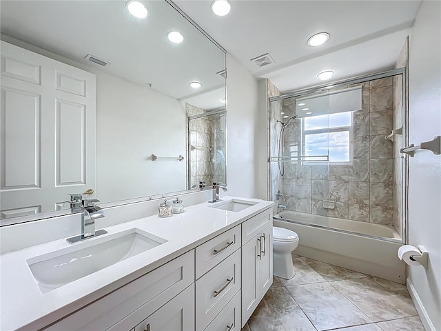 8743 S The Esplanade Unit 18, Orlando, FL 32836 - bathroom featuring double vanity, shower / tub combination, and recessed lighting