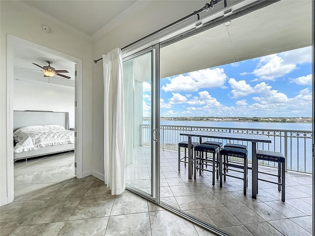 8743 S The Esplanade Unit 18, Orlando, FL 32836 - dining area featuring a water view, crown molding, and a ceiling fan
