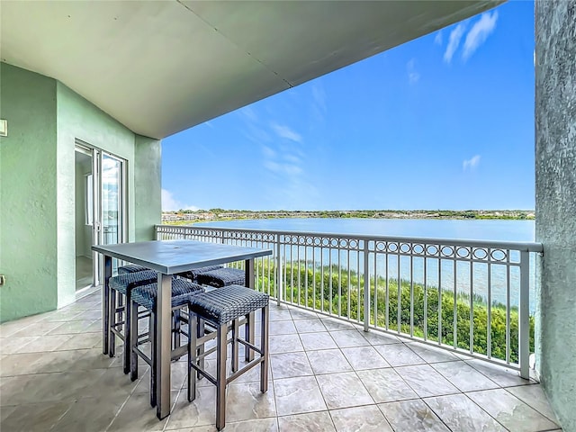 8743 S The Esplanade Unit 18, Orlando, FL 32836 - balcony featuring a water view