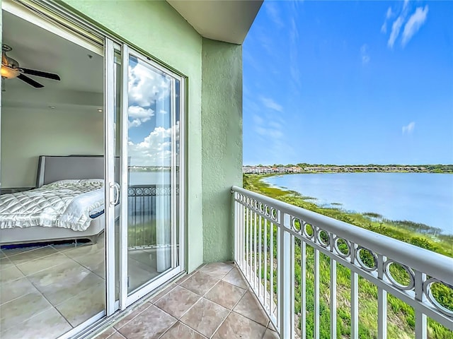 8743 S The Esplanade Unit 18, Orlando, FL 32836 - balcony with a water view and ceiling fan