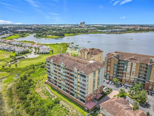 8743 S The Esplanade Unit 18, Orlando, FL 32836 - drone / aerial view of a nearby body of water and apartment complex