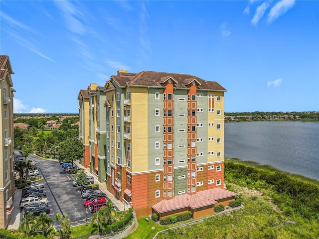 8743 S The Esplanade Unit 18, Orlando, FL 32836 - view of apartment building / complex featuring a water view