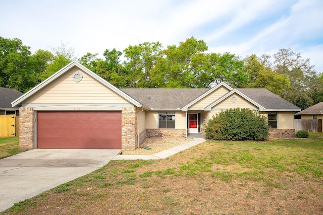 2132 Majestic Woods Blvd, Apopka, FL 32712 - ranch-style home featuring concrete driveway, fence, brick siding, a front lawn, and a garage