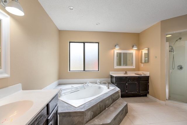 2132 Majestic Woods Blvd, Apopka, FL 32712 - bathroom with tile patterned flooring, a sink, a stall shower, and a bath