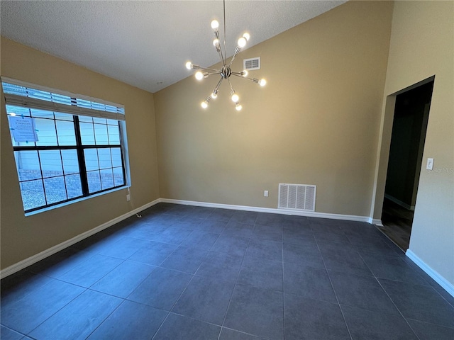 2132 Majestic Woods Blvd, Apopka, FL 32712 - unfurnished room featuring a chandelier, lofted ceiling, baseboards, visible vents, and dark tile patterned flooring