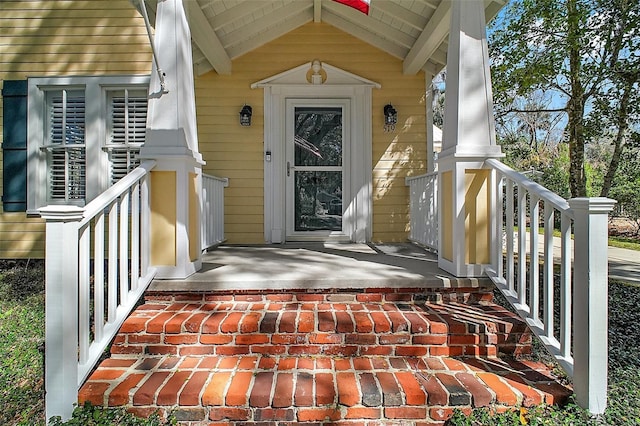 entrance to property with a porch