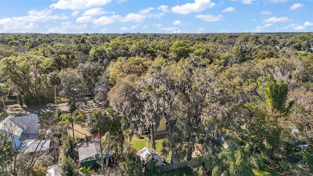 bird's eye view featuring a view of trees
