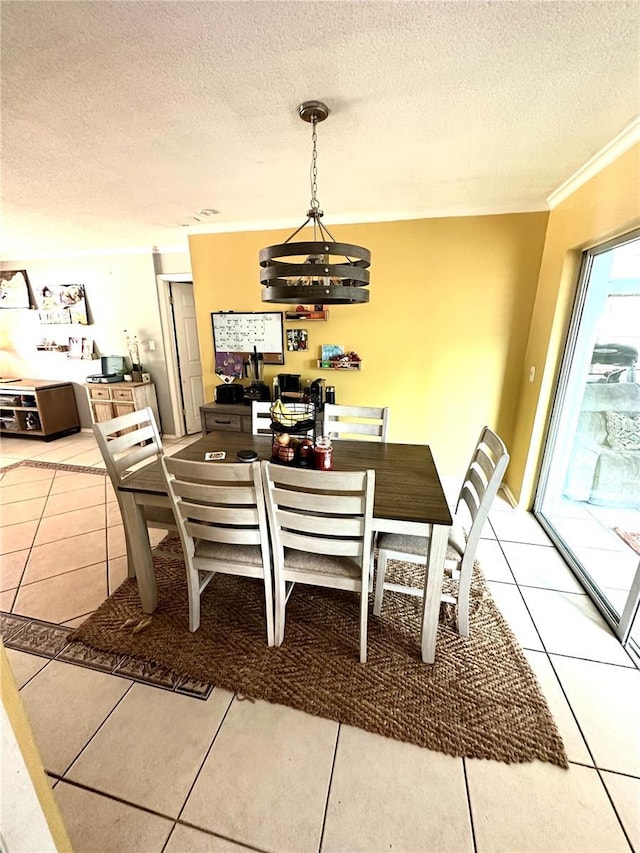 1098 Henry Balch Dr, Orlando, FL 32810 - dining space with crown molding, light tile patterned flooring, and a textured ceiling