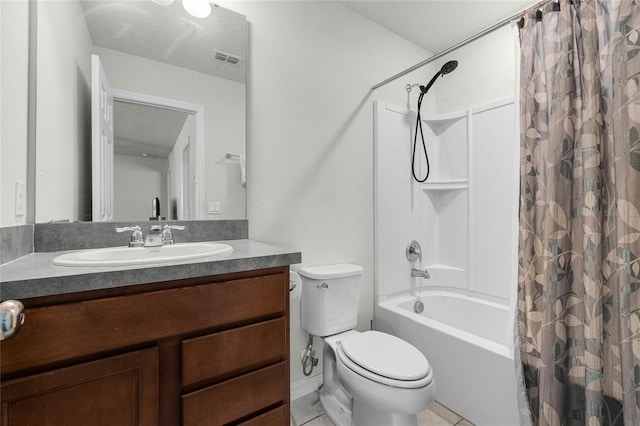 bathroom featuring vanity, tile patterned flooring, visible vents, toilet, and shower / bath combo