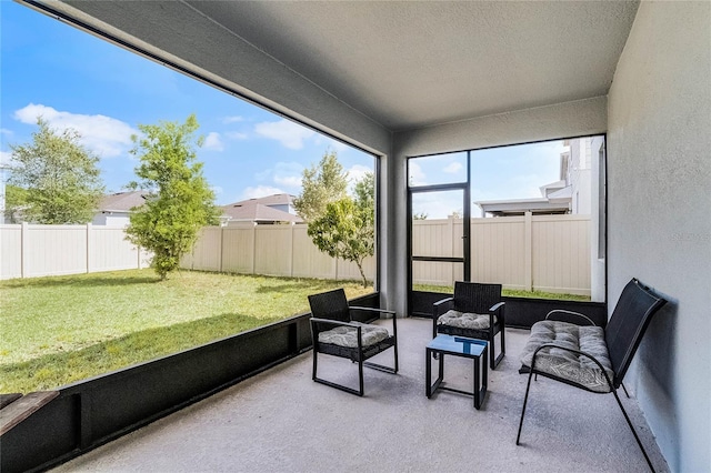 sunroom / solarium with an outdoor hangout area