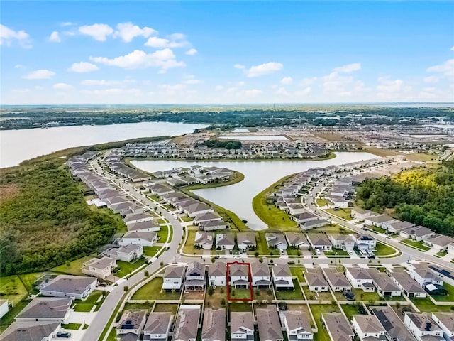 aerial view with a water view and a residential view