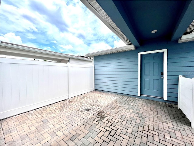 view of patio with fence