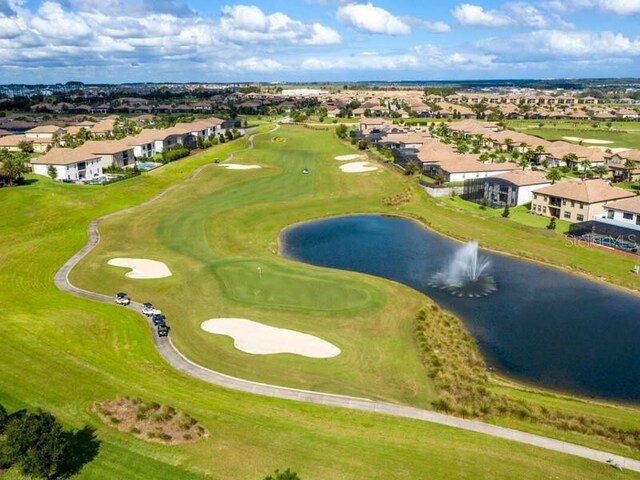 428 Ocean Course Ave, Davenport, FL 33896 - aerial perspective of suburban area featuring a large body of water and a golf course