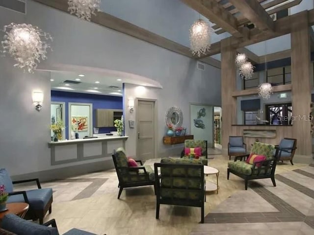 428 Ocean Course Ave, Davenport, FL 33896 - community lobby featuring a high ceiling and beamed ceiling