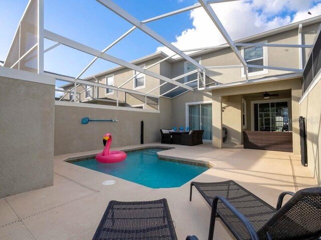 428 Ocean Course Ave, Davenport, FL 33896 - outdoor pool with a patio, a lanai, a ceiling fan, and outdoor lounge area