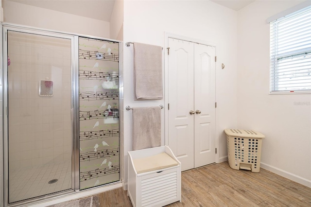 2289 Aloe Aly, Apopka, FL 32703 - full bath featuring baseboards, wood finished floors, and a stall shower