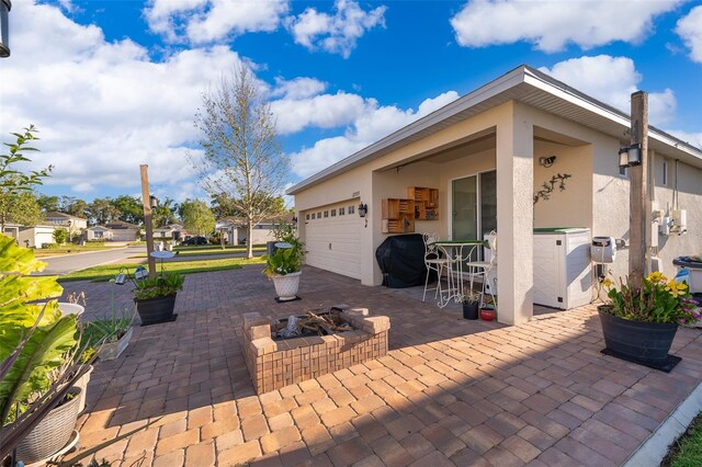 2289 Aloe Aly, Apopka, FL 32703 - view of patio featuring an attached garage