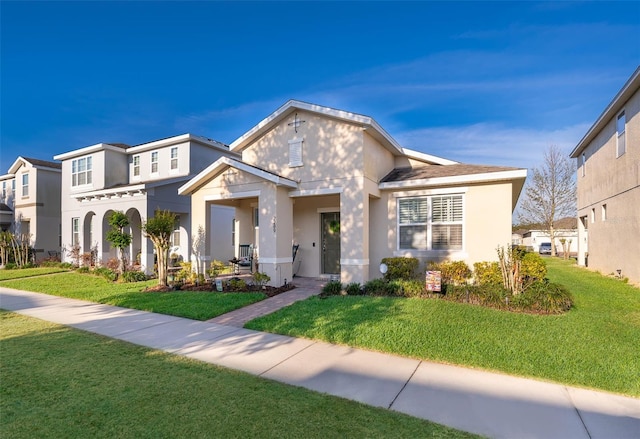2289 Aloe Aly, Apopka, FL 32703 - view of front of home with a front yard and stucco siding